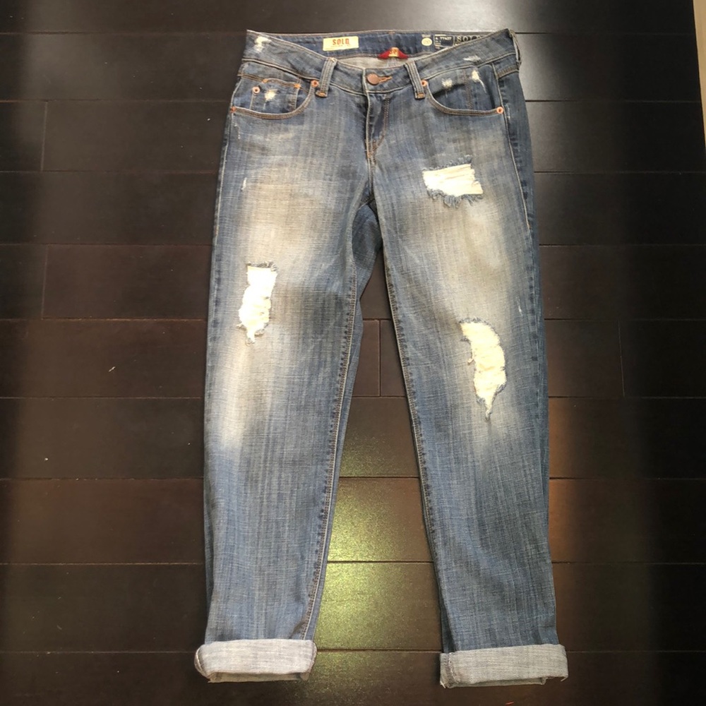 Women’s low rise ripped jeans